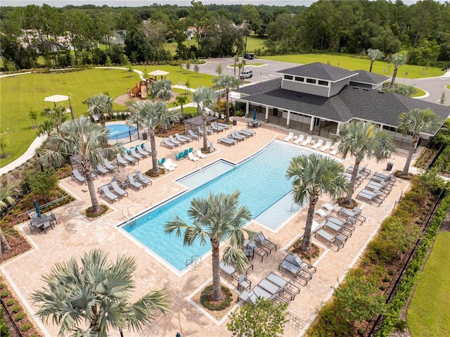 2813 Sanctuary Dr, Clermont, FL 34714 - community pool featuring a patio area