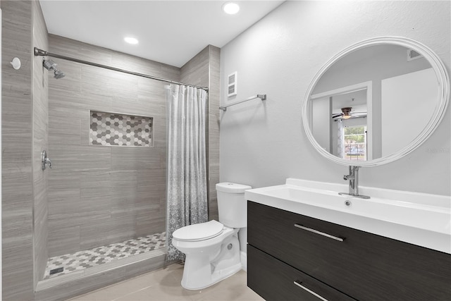 7350 Westpointe Blvd Unit 215, Orlando, FL 32835 - full bath featuring ceiling fan, vanity, tiled shower, tile patterned flooring, and recessed lighting