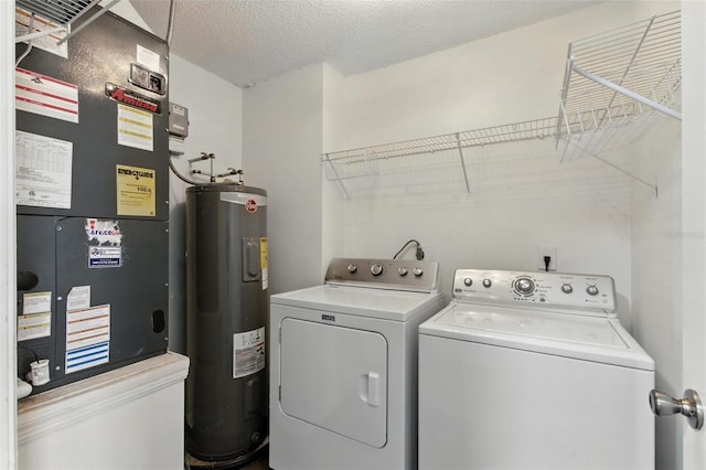 669 Whitetail Loop, Apopka, FL 32703 - laundry room featuring water heater, independent washer and dryer, heating unit, and a textured ceiling