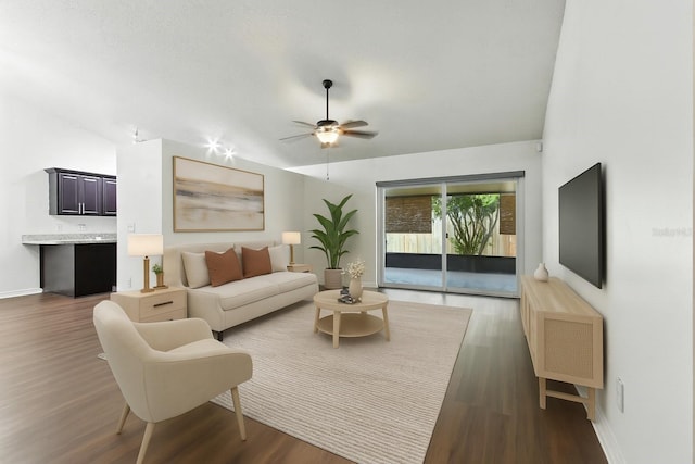 669 Whitetail Loop, Apopka, FL 32703 - living room featuring vaulted ceiling, wood finished floors, and a ceiling fan