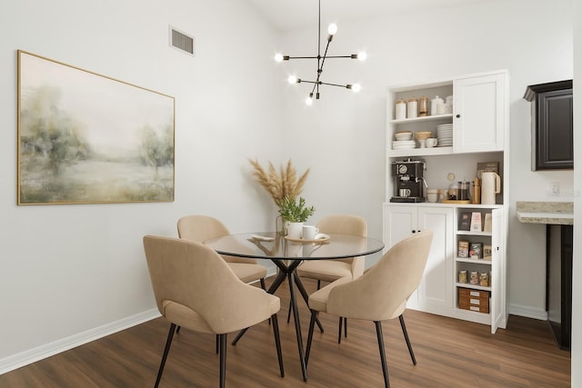 669 Whitetail Loop, Apopka, FL 32703 - dining room with wood finished floors and a chandelier