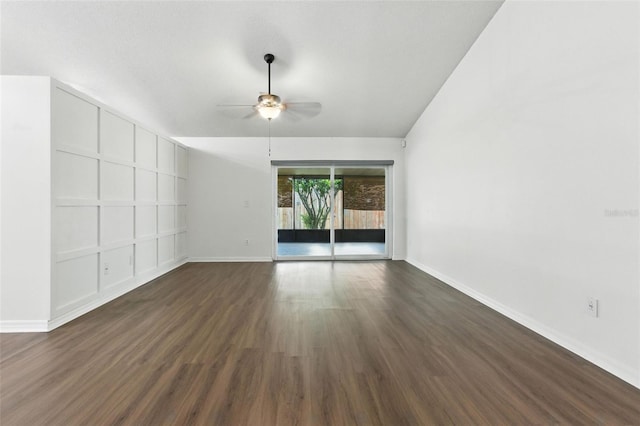 669 Whitetail Loop, Apopka, FL 32703 - unfurnished room with ceiling fan, dark wood-style flooring, and vaulted ceiling