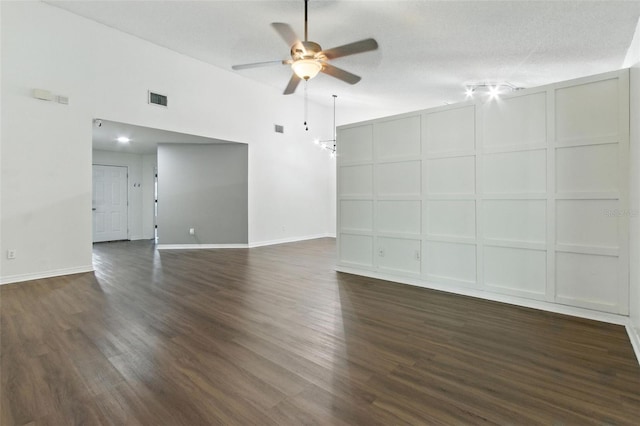 669 Whitetail Loop, Apopka, FL 32703 - spare room featuring ceiling fan, dark wood finished floors, and lofted ceiling