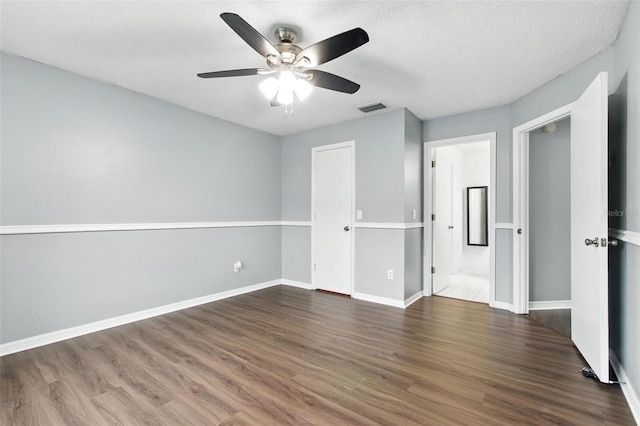 669 Whitetail Loop, Apopka, FL 32703 - unfurnished bedroom featuring wood finished floors and ceiling fan