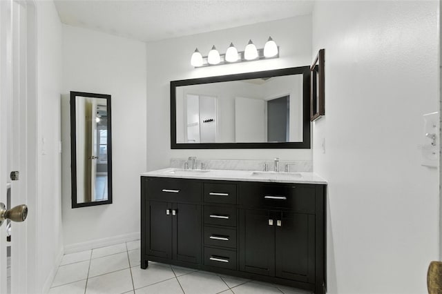 669 Whitetail Loop, Apopka, FL 32703 - bathroom featuring double vanity and tile patterned flooring