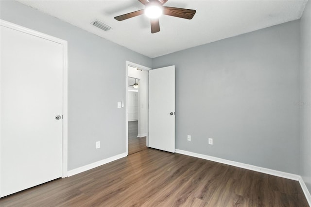 669 Whitetail Loop, Apopka, FL 32703 - unfurnished bedroom featuring wood finished floors and a ceiling fan