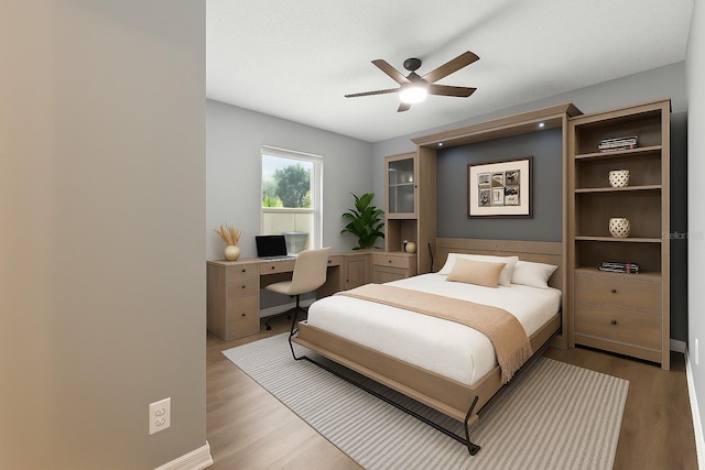669 Whitetail Loop, Apopka, FL 32703 - bedroom with wood finished floors, an office area, and a ceiling fan