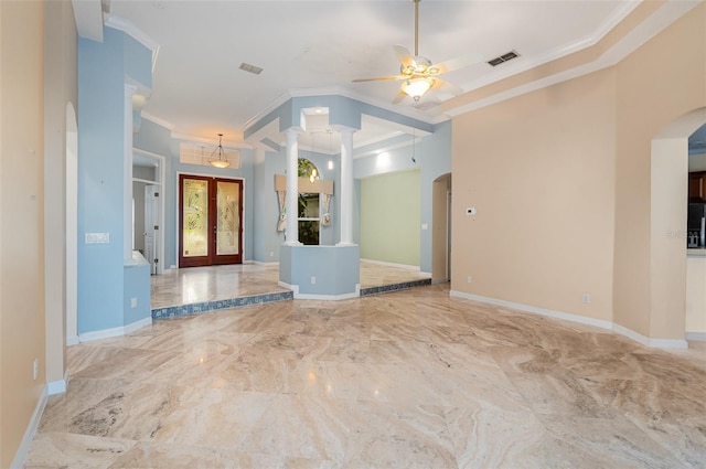 2317 Warren Woods Dr, Orlando, FL 32835 - unfurnished living room with arched walkways, crown molding, a ceiling fan, marble tiled floors, and decorative columns