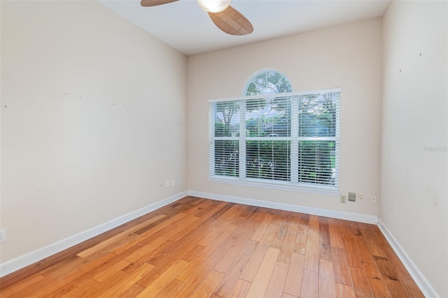 2317 Warren Woods Dr, Orlando, FL 32835 - empty room with light wood finished floors and a ceiling fan