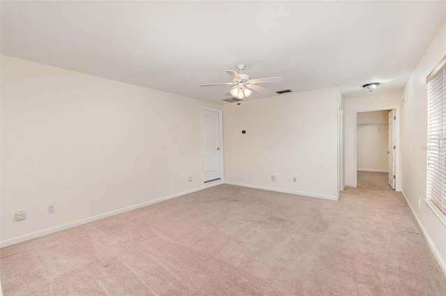 2317 Warren Woods Dr, Orlando, FL 32835 - spare room with a ceiling fan and light colored carpet