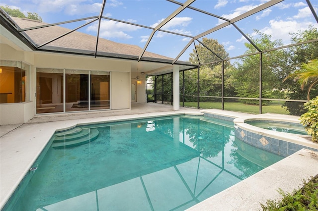 2317 Warren Woods Dr, Orlando, FL 32835 - view of swimming pool with a patio, a pool with connected hot tub, and glass enclosure