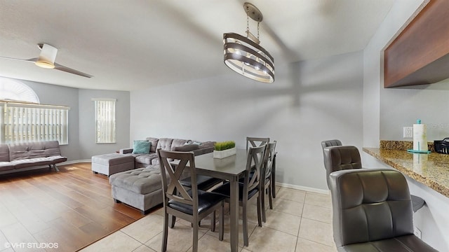 3151 Britannia Blvd Unit A, Kissimmee, FL 34747 - dining space with a ceiling fan and light tile patterned floors