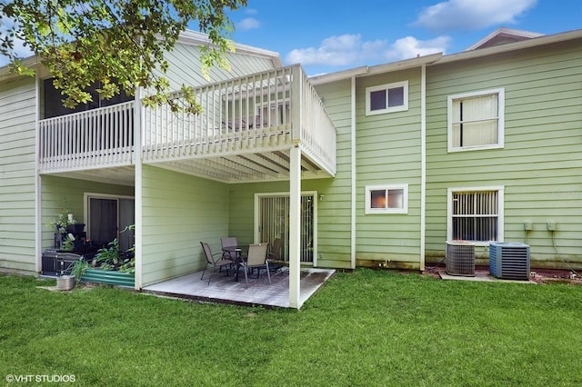 3151 Britannia Blvd Unit A, Kissimmee, FL 34747 - back of house with a patio area and a yard