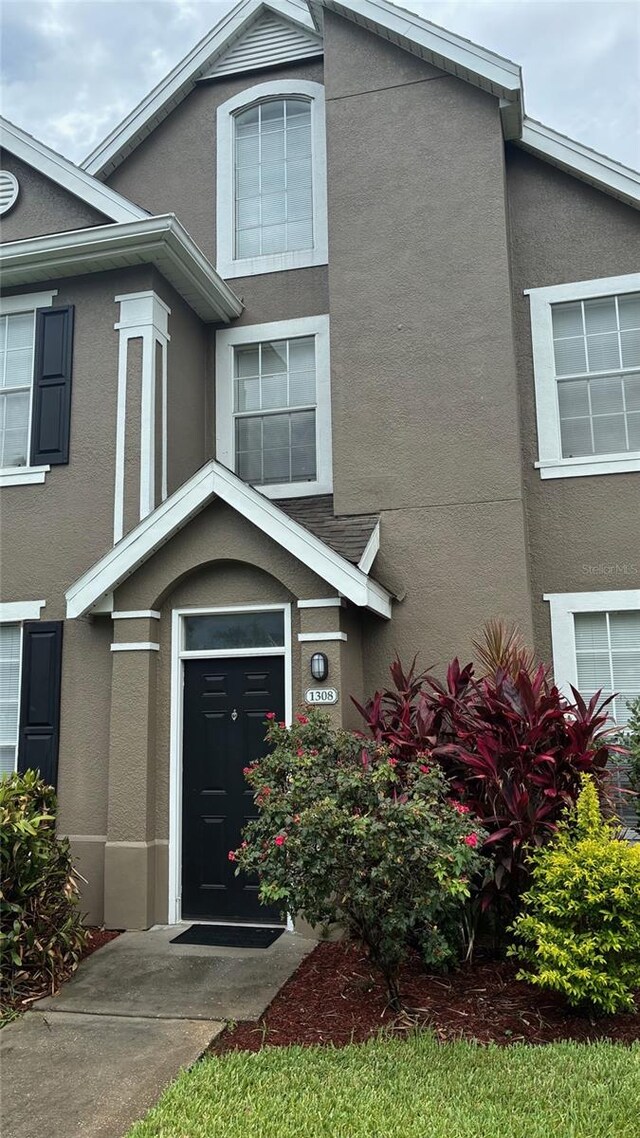 view of property featuring stucco siding