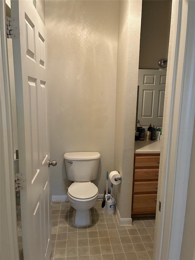 bathroom featuring vanity and tile patterned flooring