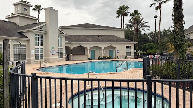 community pool featuring a patio