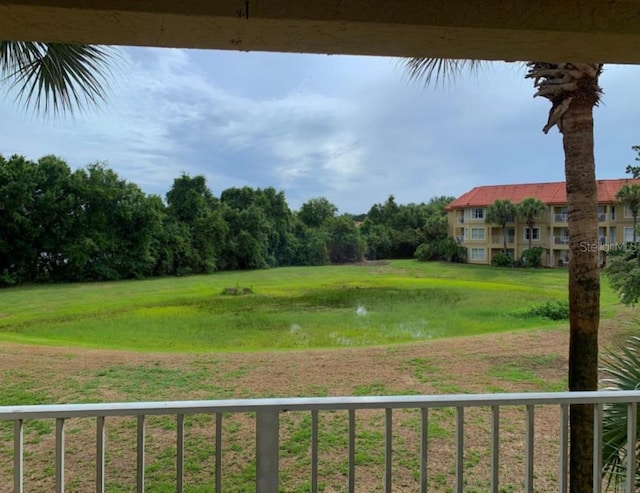 6336 Parc Corniche Dr, Orlando, FL 32821 - view of yard featuring a balcony