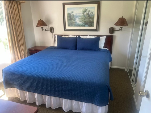 6336 Parc Corniche Dr, Orlando, FL 32821 - bedroom featuring carpet flooring and baseboards