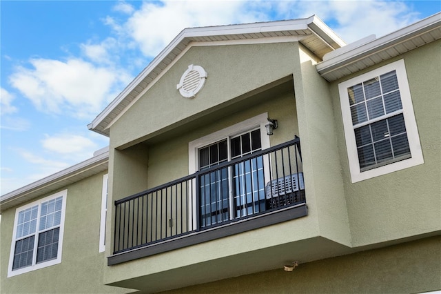 4027 Pemberly Pines Cir, Saint Cloud, FL 34769 - view of home's exterior with stucco siding and a balcony