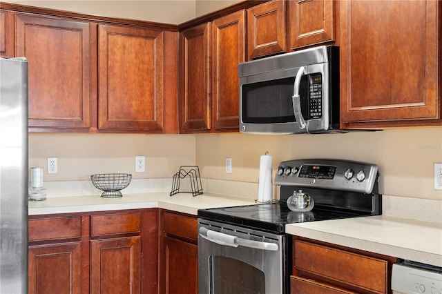 4027 Pemberly Pines Cir, Saint Cloud, FL 34769 - kitchen with stainless steel appliances and light countertops