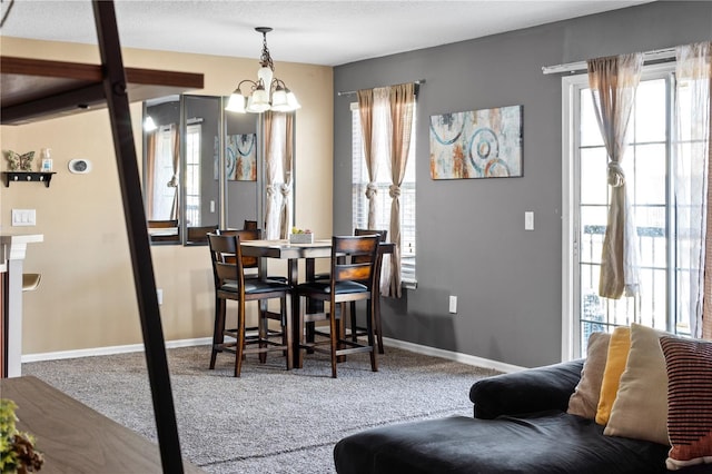 4027 Pemberly Pines Cir, Saint Cloud, FL 34769 - dining area with a chandelier and carpet flooring