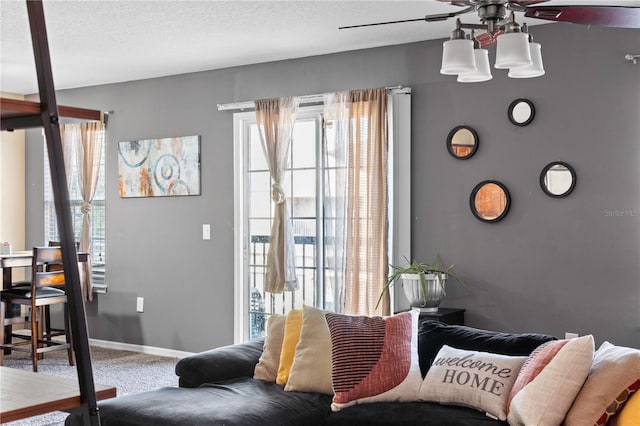 4027 Pemberly Pines Cir, Saint Cloud, FL 34769 - carpeted living room featuring ceiling fan and healthy amount of natural light
