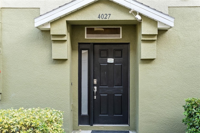 4027 Pemberly Pines Cir, Saint Cloud, FL 34769 - property entrance featuring stucco siding