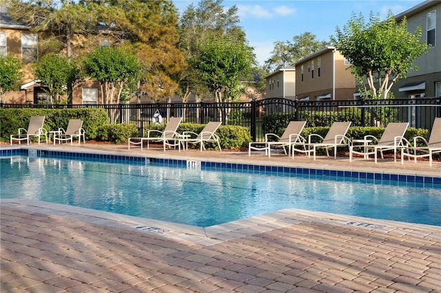 4027 Pemberly Pines Cir, Saint Cloud, FL 34769 - community pool with a patio