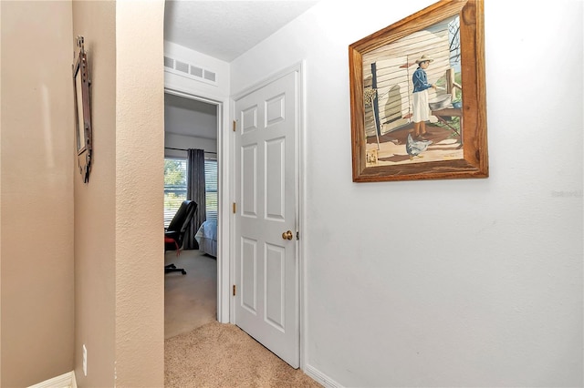 153 Juniper Run, Ocala, FL 34480 - hall featuring carpet and baseboards