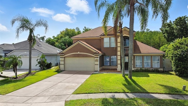 12419 Sion Ct, Orlando, FL 32824 - traditional-style home with stucco siding, a garage, concrete driveway, and a front yard