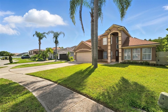 12419 Sion Ct, Orlando, FL 32824 - view of front of house featuring concrete driveway, stucco siding, and a front yard