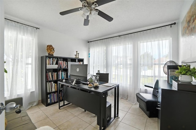 12419 Sion Ct, Orlando, FL 32824 - office space featuring a ceiling fan, light tile patterned flooring, and a textured ceiling