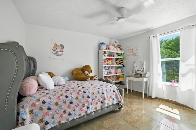 12419 Sion Ct, Orlando, FL 32824 - bedroom with tile patterned flooring, a textured ceiling, and ceiling fan