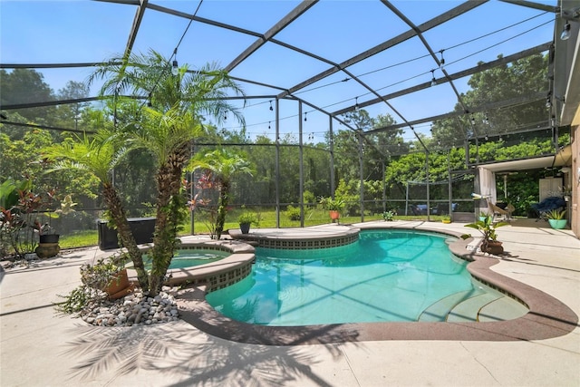 12419 Sion Ct, Orlando, FL 32824 - view of pool featuring a patio area, a pool with connected hot tub, and a lanai