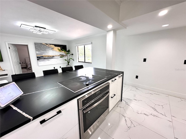 6258 Masters Blvd Unit C204, Orlando, FL 32819 - kitchen with oven, black electric stovetop, ornamental molding, dark countertops, and light marble finish floors