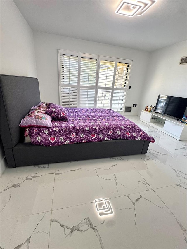 6258 Masters Blvd Unit C204, Orlando, FL 32819 - bedroom with marble look tile flooring