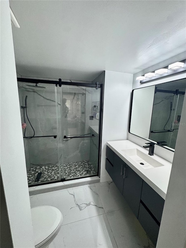 6258 Masters Blvd Unit C204, Orlando, FL 32819 - bathroom with marble look tiles, vanity, and a marble finish shower