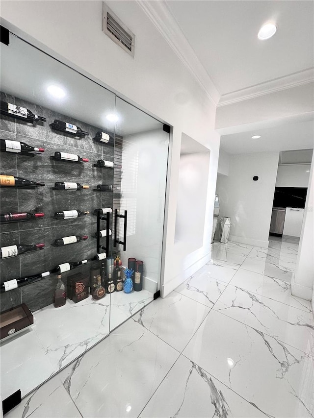 6258 Masters Blvd Unit C204, Orlando, FL 32819 - wine area featuring ornamental molding, marble finish flooring, and recessed lighting