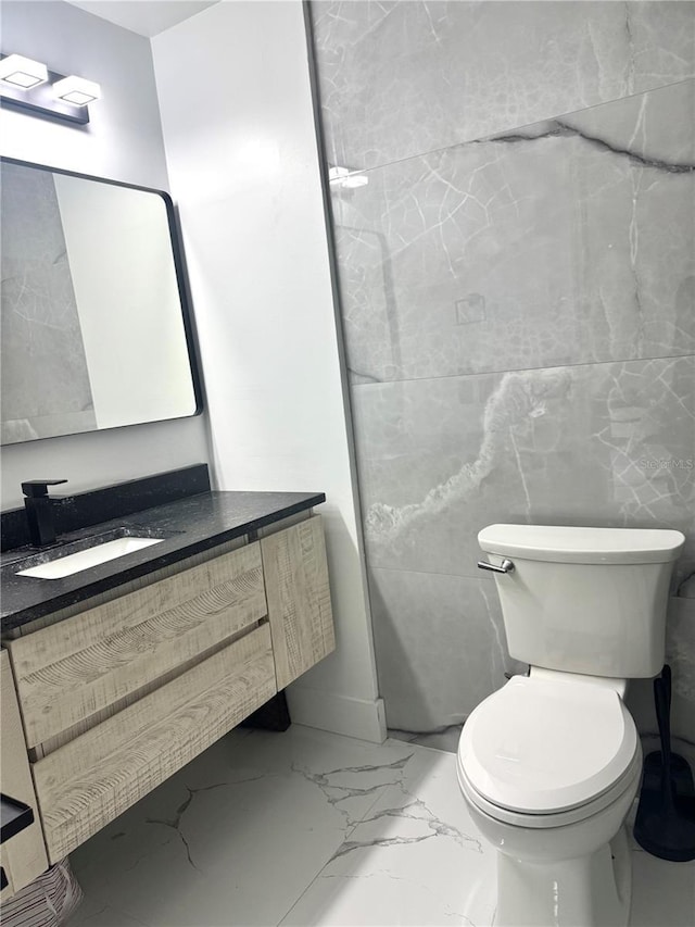6258 Masters Blvd Unit C204, Orlando, FL 32819 - bathroom with marble finish floors and vanity