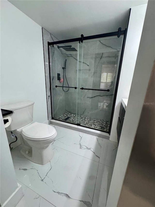 6258 Masters Blvd Unit C204, Orlando, FL 32819 - bathroom with marble look tile flooring, vanity, and a marble finish shower