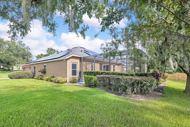274 Wekiva Pointe Cir, Apopka, FL 32712 - view of home's exterior featuring stucco siding, solar panels, and glass enclosure