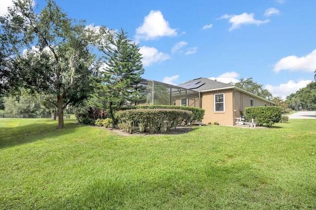 274 Wekiva Pointe Cir, Apopka, FL 32712 - view of grassy yard with a lanai