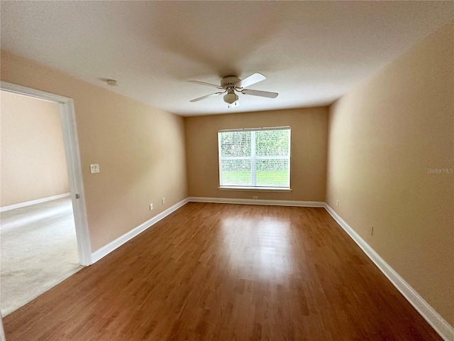 1676 Vick Rd, Apopka, FL 32712 - unfurnished room featuring a ceiling fan and wood finished floors