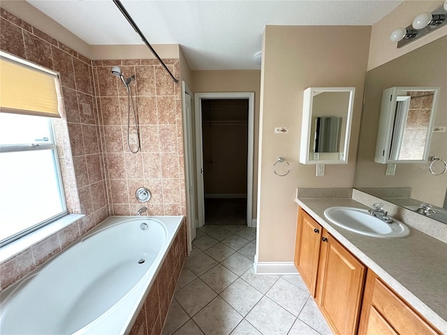1676 Vick Rd, Apopka, FL 32712 - bathroom with vanity, tiled shower / bath, and tile patterned flooring