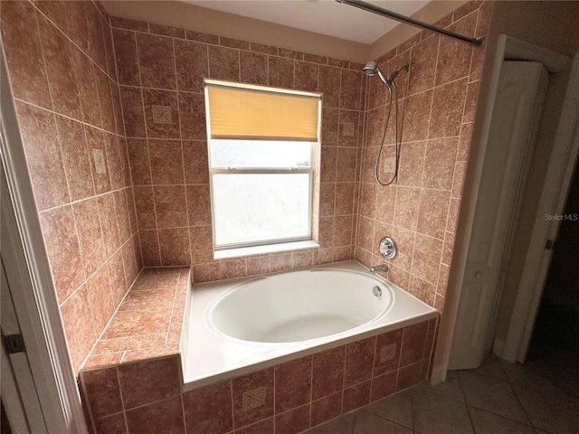 1676 Vick Rd, Apopka, FL 32712 - bathroom with tile patterned flooring and tiled shower / bath