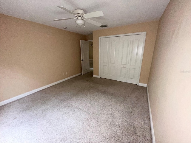 1676 Vick Rd, Apopka, FL 32712 - unfurnished bedroom featuring a closet, carpet floors, and ceiling fan