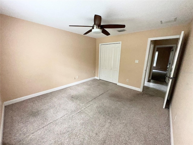 1676 Vick Rd, Apopka, FL 32712 - unfurnished bedroom featuring carpet flooring, a closet, and ceiling fan