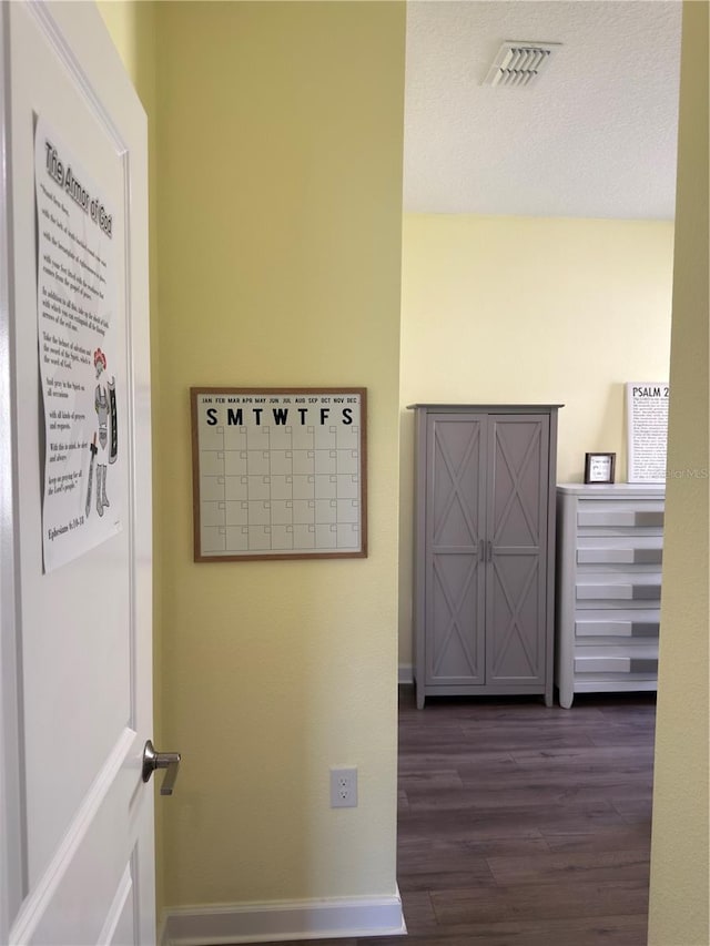 1047 Oak Bluff Dr, Davenport, FL 33837 - hall featuring dark wood-type flooring and baseboards