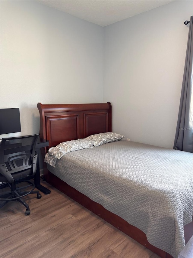 1047 Oak Bluff Dr, Davenport, FL 33837 - bedroom with wood finished floors