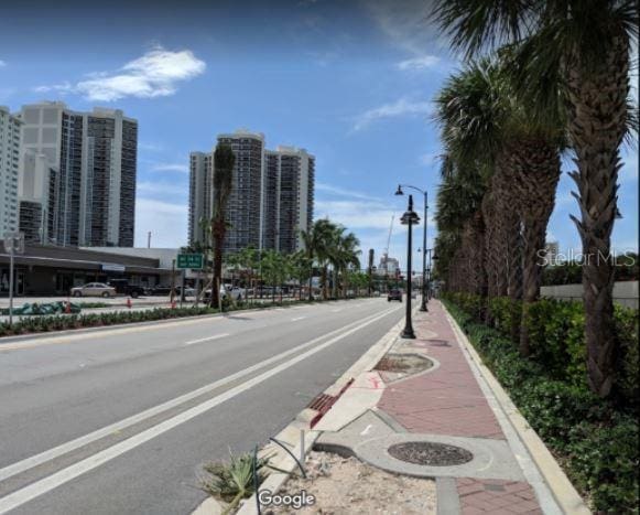 3410 Galt Ocean Dr Unit 1406N, Fort Lauderdale, FL 33308 - view of asphalt road featuring sidewalks, street lights, and a view of city